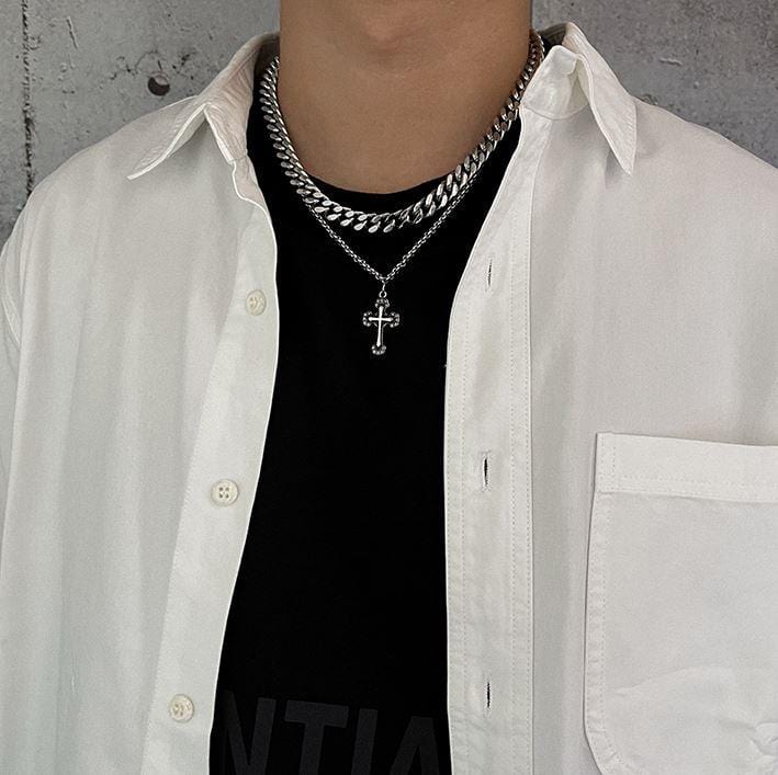 Necklace with Modern double chain, made of steel and gold cross